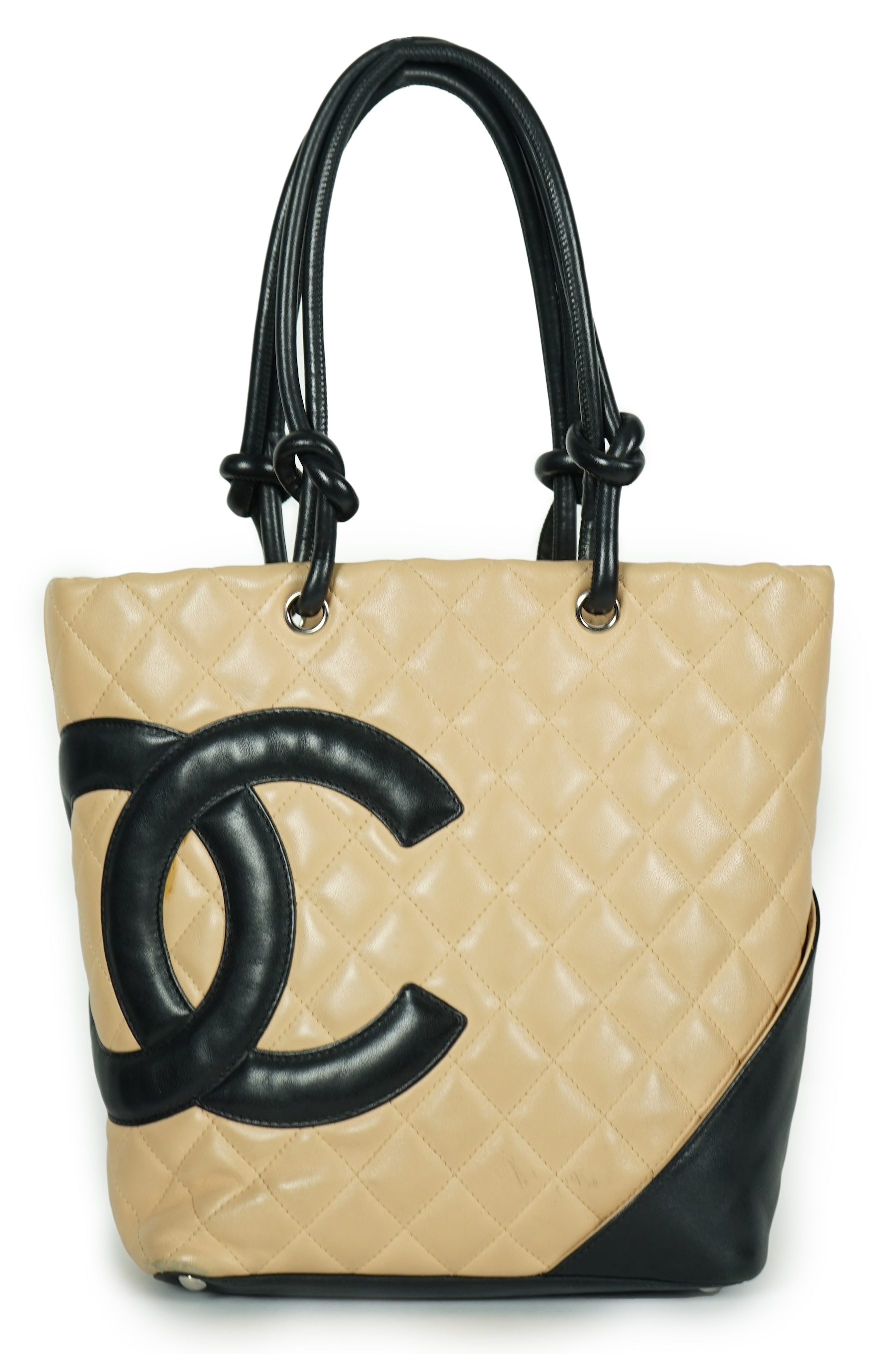 A Chanel Cambon Ligne black and beige quilted leather tote, width 26cm, height 24cm, overall height 40cm, depth 11cm, Please note this lot attracts an additional import tax of 20% on the hammer price